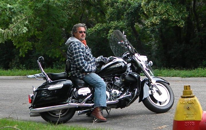 Chris Murray on his Harley